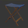 Wooden Folding Stool With Brown Fabric Seat And X Shaped Legs