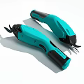 Turquoise And Black Electric Scissors With Modern Design And Ergonomic Handles For Household Use