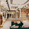 MZAR Clothing Store Front Window Display Featuring Mannequins Dressed In Stylish Suits And Modern Lighting