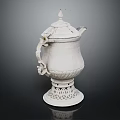 Elegant White Electric Kettle With Ornate Carved Design And Decorative Base
