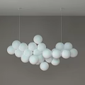 Unique Shaped Pendant Light With White Spheres Hanging In Modern Interior
