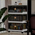 Transparent Glass Door Storage Cabinet With Multiple Layers Organized Books And Toys In Home Interior
