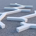 Modern White Branch Shaped Outdoor Landscape Seats On Cobblestone Pavement