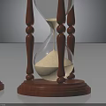 Three Wooden Hourglasses With Sand On Black Surface And Clear Reflections