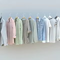 Stylish Hanging Clothes Various Styles Pastel Light Colors Shirts Denim Jackets T-shirts on Hangers