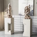 Traditional Carved Stone Sculptures Displayed on White Pedestals for Indoor Decor