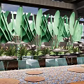 Garden Decorative Pieces With Green Leafy Plants And Artistic Potted Arrangements