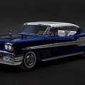 Vintage Blue And White Classic Car With Streamlined Body And Chrome Details