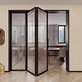 Transparent Glass Folding Door With Black Frame In Modern Indoor Space With Herringbone Wooden Floor