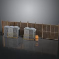 Gray Industrial Units With Yellow Safety Rails And Wooden Fence Panels Plus Orange Barrel