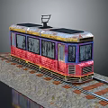 Vintage Tram With Red Yellow Purple Decor Black Roof Old Windows On Rail Tracks Gravel Path