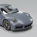 Gray Sleek Sports Car With Two Door Design And Sporty Alloy Wheels For Modern Driving