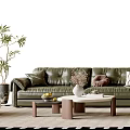 Green Leather Sofa And Wooden Coffee Table Set With Decorative Cushions Potted Plant And White Armchair