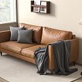 Comfortable Brown Leather Two Seater Sofa With Grey Cushions Throw Blanket And Floor Lamp Near Window