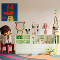White Storage Cabinet In Kids Room With Cartoon Decor Small Items And Toys