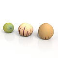 Three Exotic Fruits With Green Purple Striped And Tan Skin Displaying Unique Patterns