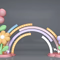 Colorful Event Entrance Arch With Rainbow Design Flowers Lights And Leaves