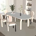 Modern White Oval Dining Table Set With White Chairs Black Legs And Greenery Vase