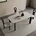 Modern Restaurant Interior With Neutral Beige Walls Wooden Dining Table Black Chairs And Framed Artwork