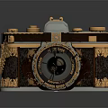 Vintage Digital Camera With Gold And Silver Decorative Design Details