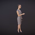 Elegant Woman in Gray Dress with Bun Hairstyle Holding Mobile Phone Against Dark Background