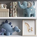 Plush Stuffed Toys Arranged On Shelves With Art And Baskets