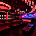 Modern Vibrant Club Interior With Neon Lights Large Screen And Seating Area