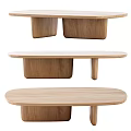 Three Modern Oval Shaped Wooden Coffee Tables In Different Natural Wood Tones