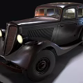 Vintage Black Car with Retro Grille Headlights and Old Tires on Gravel Ground