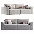 Modern Two-Seater Sofa With Soft Gray Upholstery And Stylish Decorative Pillows