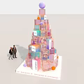 Colorful Tower Like Structure With Stacked Cubes Top Sphere DREAM Lettering And Person Standing Beside