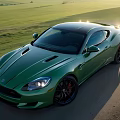 Green Sports Car Parked On Rural Road With Sunlit Green Fields Around