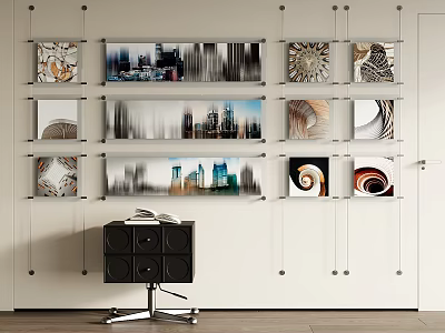 Multiple Abstract Paintings Hung on Wall with Spiral and Cityscape Patterns and Black Cabinet Below 3d model