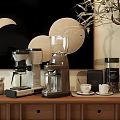 Stylish Kitchen Countertop With Coffee Machine Blender And Coffee Cups Jars Plant And Wall Art