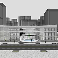 Modern Commercial Complex With Central Plaza Fountain Surrounding Trees And Street Vehicles