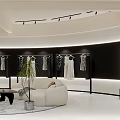 Modern Clothing Store Interior With Mannequins Clothes Display Sofa Rug And Lighting