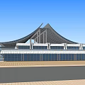 Modern Public Building Exterior With Wavy Roof Design And Surrounding Green Parking Areas