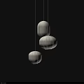 Three Modern Lantern Shaped Fabric Pendant Lights With Soft Lighting On Dark Background 3d model
