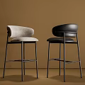 Modern Bar Stools With Light Gray And Black Seats And Metal Frames In Brown Background