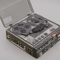 Vintage Audio Tape Recorder With Open Transparent Cover Tape Reels Control Buttons