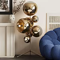 Gold Metallic Reflective Floor Lamp With Multiple Spherical Shades By Blue Sofa Interior