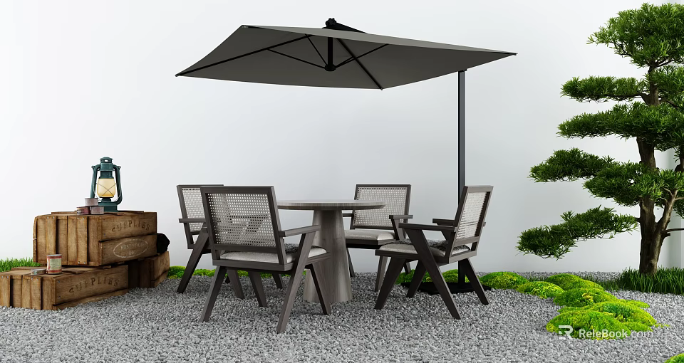Outdoor Table With Chairs and Umbrella in Gravel Area Decorated With Green Plants 3d model 