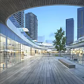 Modern Commercial Street with Glass Facades Pedestrian Walkway Trees and High Rise Buildings