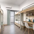 School Dormitory Room With Bunk Beds Study Desks Laptops And Bookshelves