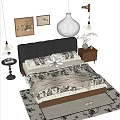 Elegant Double Bed with Black Leather Headboard Floral Bedding Nightstand Area Rug and Wall Art