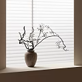 Wooden Vase With Branches And Small Blooms On Window Sill By Blinds In Natural Light