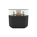 Jewelry Display Case with Glass Top and Wooden Cabinet Featuring Black Mannequins and Decorative Object