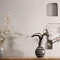 Decorative Vases With Pink Flowering Branches Gray And Black White Striped On Wooden Surface Against Light Wall With Niches