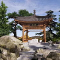 Classical Chinese Pavilion Surrounded By Trees Stones And Steps