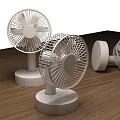 Three White Portable Air Cooler Fans With Simple Design On Wooden Table